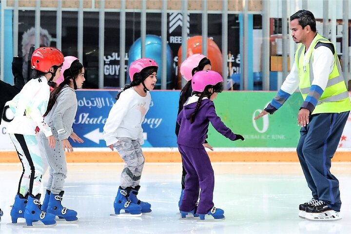 Experience the joy of ice skating at the Dubai Ice Rink where all ages can learn and laugh while enjoying a unique winter setting amidst the bustling Dubai Mall.